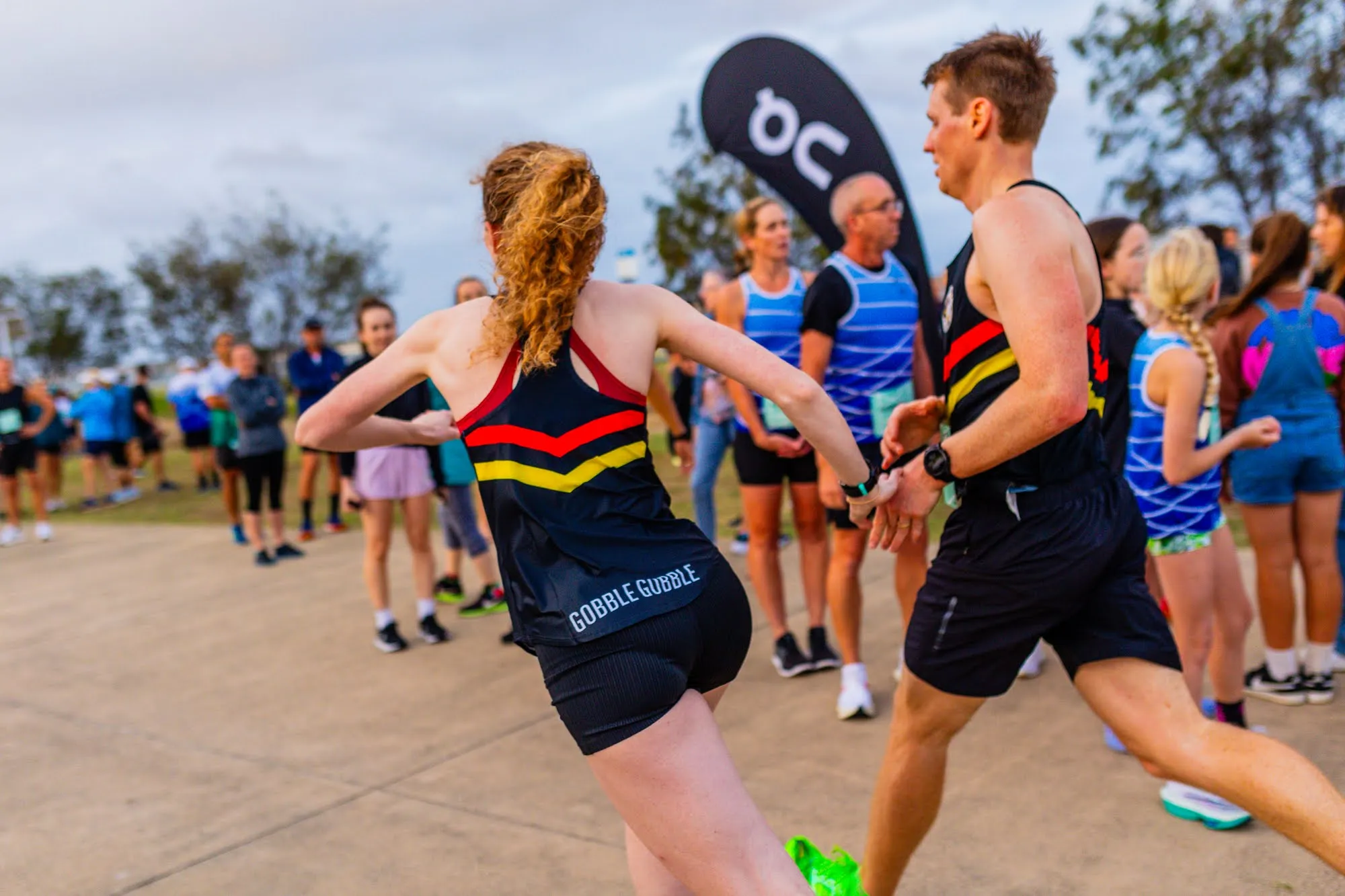 Britt Jones and Aidan Dineen at the On Running Squadrace relay, 2023