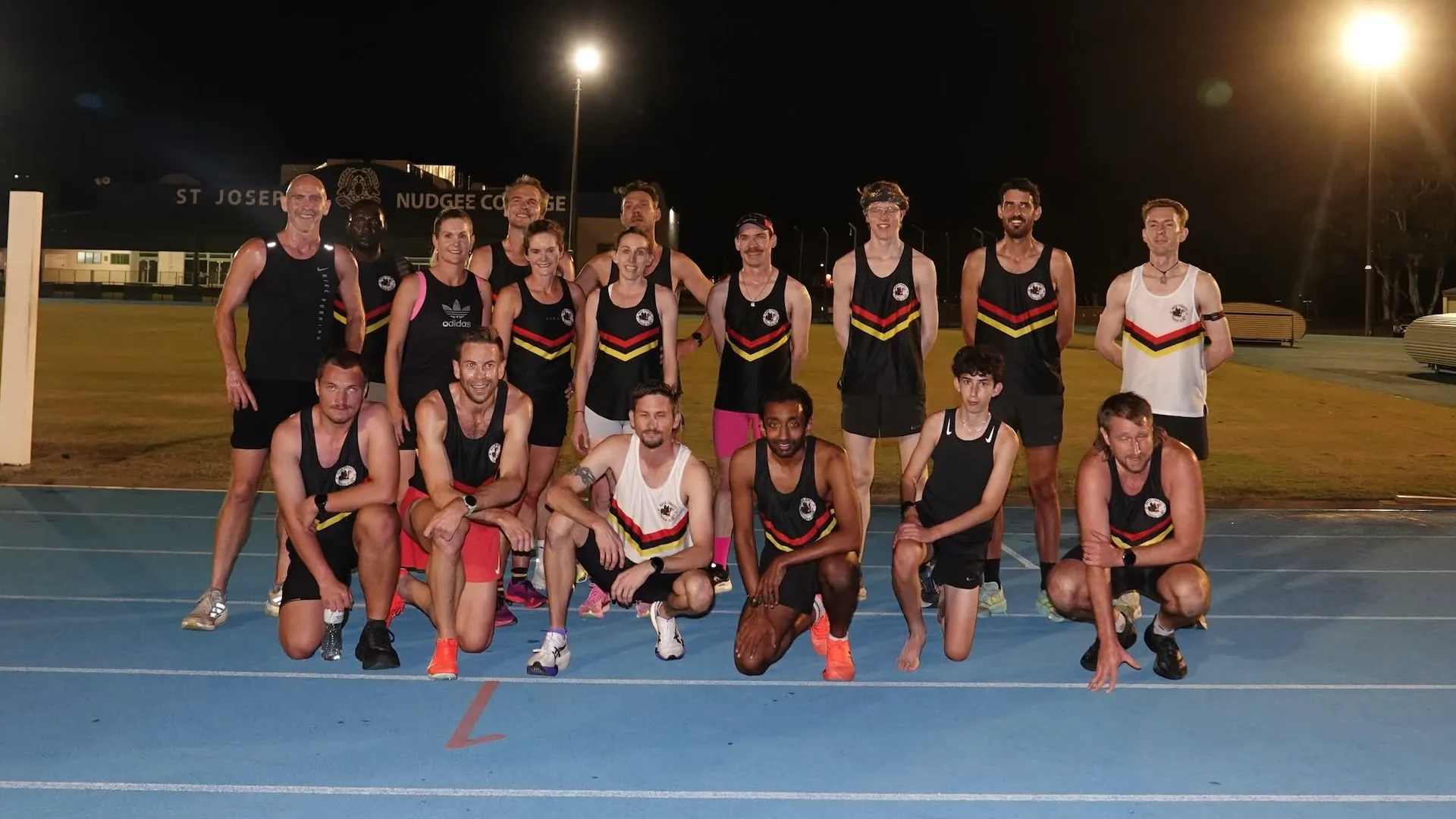 Bush Turkey runners gathered on the Nudgee College athletics track after the 2026 Nudgee Gift
