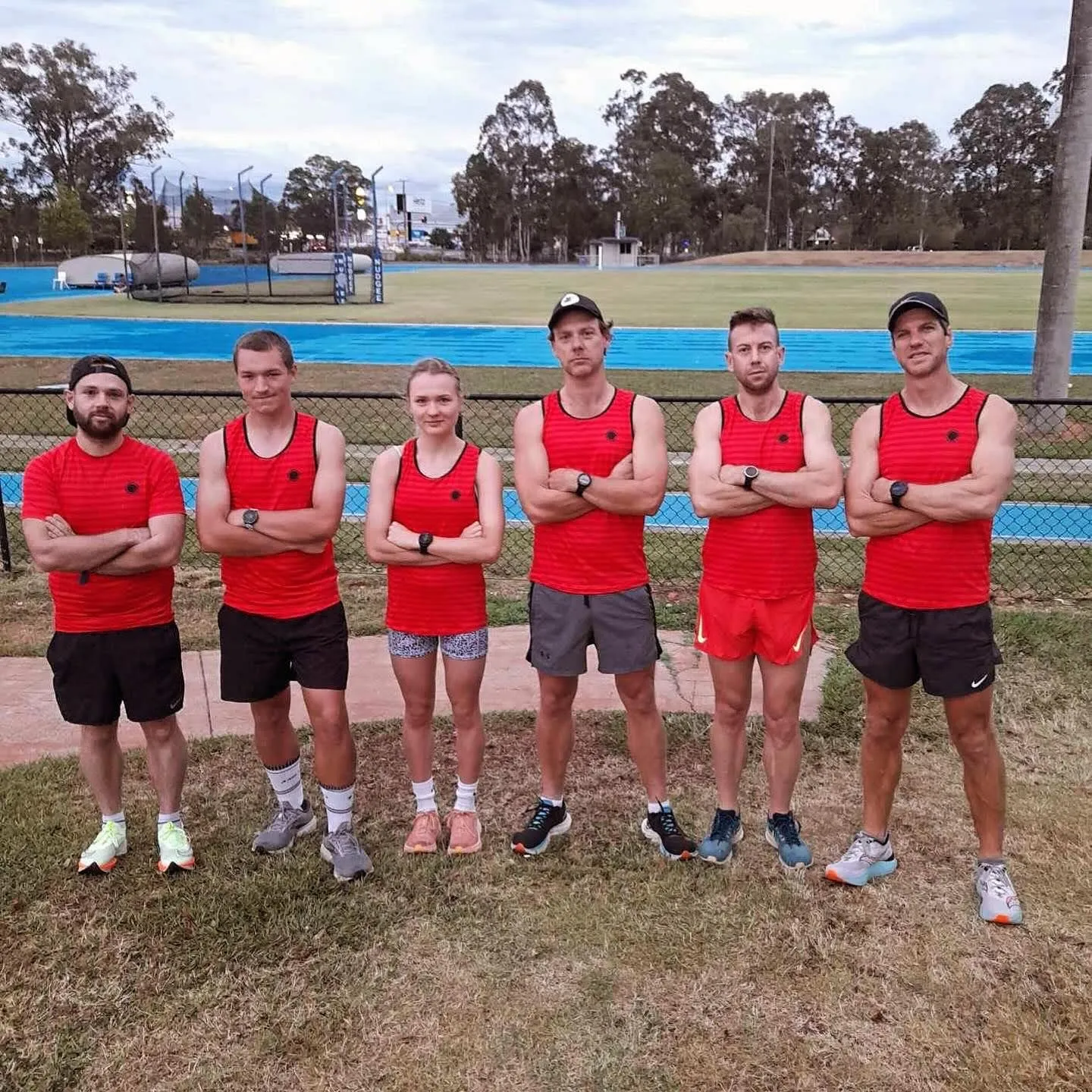 Red Team, captained by James Laird, in red singlets